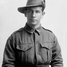 Portrait of a young man in an Australian Army uniform.   Family name Gillespie.