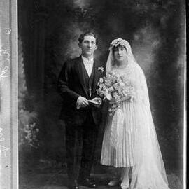 A wedding couple in a studio.