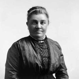 Studio portrait of an unidentified middle-aged woman