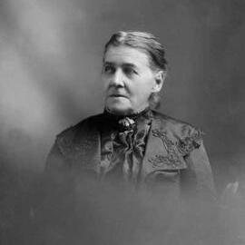 Studio portrait of  Mrs. Wallace.