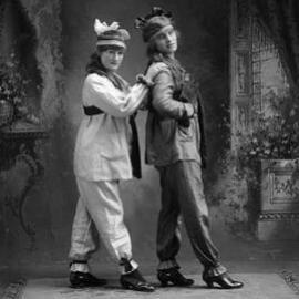 Two young women in fancy dress.