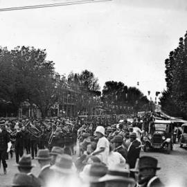 A large procession through a main street in Benalla.