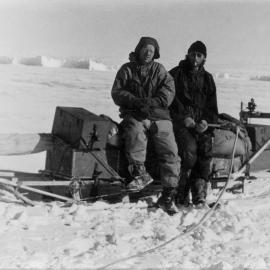 Loewe and other sitting on sled