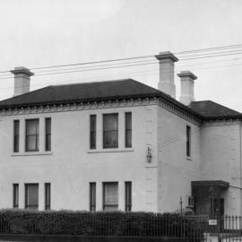 A two storey dwelling in Lygon Street, Carlton, Victoria.