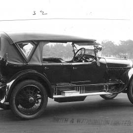 Motor car.