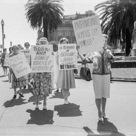 Women march along Spring Street, Melbourne for International Women's Day, 1962.