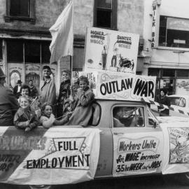A  float promoting "higher wages, shorter hours and outlaw war" in Melbourne.