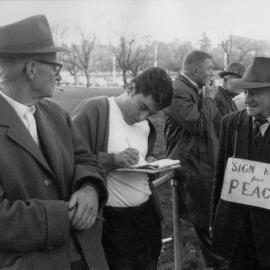 Gathering signatures for a peace petition in Melbourne.