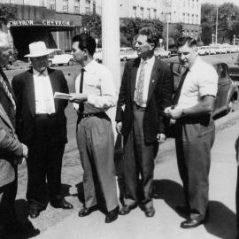 Trade Union officials outside the United States Consulate in  Melbourne.