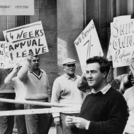Waterside workers demonstrating outside shipowners' offices in Melbourne.