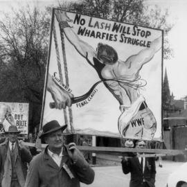 Waterside Workers Federation banners being carried along Batman Avenue during a May Day March in Melbourne