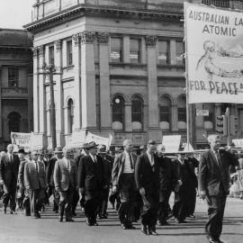 Gordon Bryant, MHR for Wills, leads a protest march past the Victorian Trades Hall building in Melbourne.