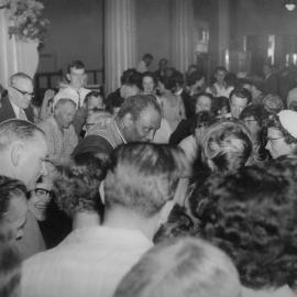 Paul Robeson being welcomed by friends and admirers at a reception in Melbourne in 1960.