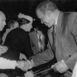 Paul Robeson being welcomed by Jim Munro at a reception in Melbourne in 1960.