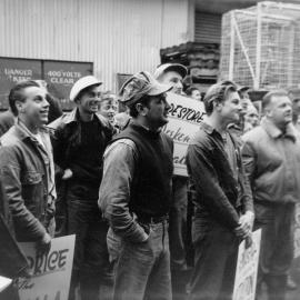 Seamen holdng protest signs at North Wharf, on the Melbourne waterfront.