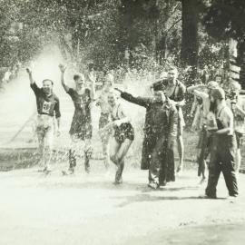 Students in lake, University of Melbourne, 1936.
