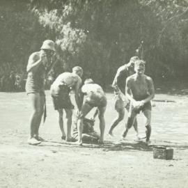 Students in lake, University of Melbourne, 1936.