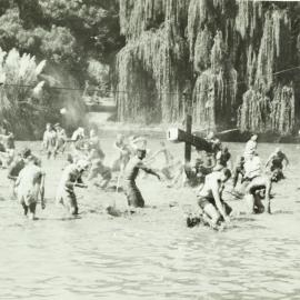 Students in lake, University of Melbourne, 1936.