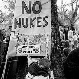 "No nukes" banner at May Day rally, 1991.