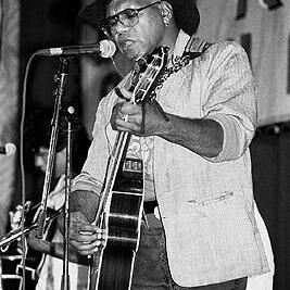 Archie Roach performs during Nelson Mandela's visit to Melbourne, 25th October 1990.