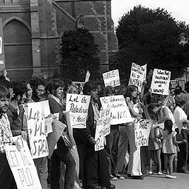 Crowds and banners at the Palestine Liberation Organisation (PLO) demonstration.