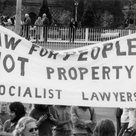 May Day march, 1975 in Melbourne with banner "Law for people not property"