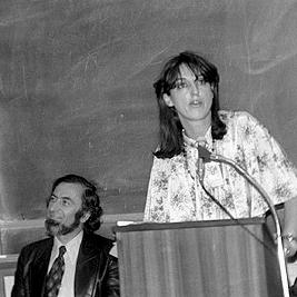 Claudia Wright speaking at a Media Action Group meeting.