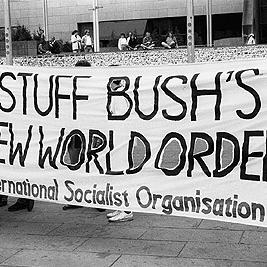 "Stuff Bush's new world order : International Socialist Organisation" banner during U.S. President George Bush's visit to Melbourne, 2 January 1992.