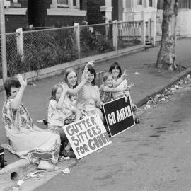 "Gutter Sitters for Gough" placards
