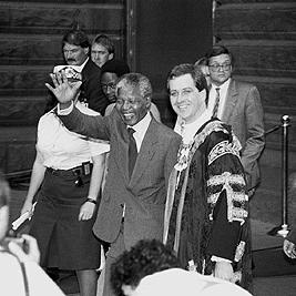Nelson Mandela greeted by crowd outside Melbourne Town Hall, 25th October 1990.