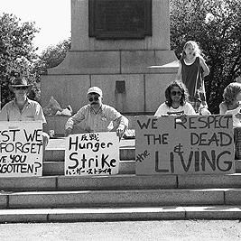 Posters outside U.S. consulate during Persian Gulf war protest, 14 January 1991.