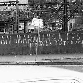 "Ban Maralinga tests, homes not bombs" graffiti, May Day, 1986.