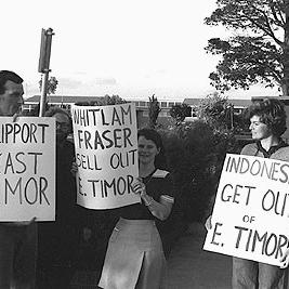 East Timorese supporters with placards, 1975.