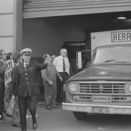 Police breaking the picket line at the Herald and Weekly Times strike.