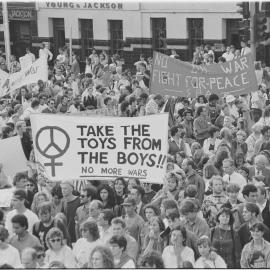 "Take the toys from the boys, stop more wars" banner at the second Persian Gulf war protest march, 25 January 1991.