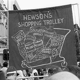 May Day, 1992 - "Hewson's Shopping Trolley" banner.