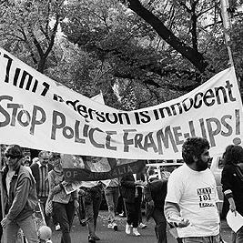 "Tim Anderson is innocent, stop police frame ups" banner at May Day rally, 1991.