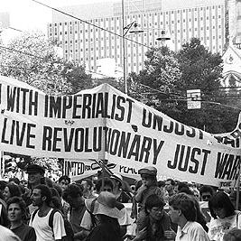 "Down with imperialist unjust war, long live revolutionary just war" banner at the second Persian Gulf war protest march, 25 January 1991.