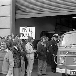Delivery vans assisted by police break through the picket line at the Printing and Kindred Industries Union (PKIU) strike.