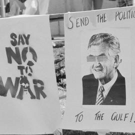 "Say no to war" and "send the politicans to the Gulf" banners outside U.S. consulate during Persian Gulf war protest, 14 January 1991.