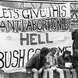 "Let's give this anti-abortionist hell" banner during U.S. President George Bush's visit to Melbourne, 2 January 1992.