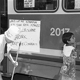 Supporters cleaning the trams in Bourke Street during Tram Conductors' Strike, December 1989.