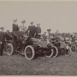 People watching car racing at a motor club gymkhana at Maribyrnong, Victoria