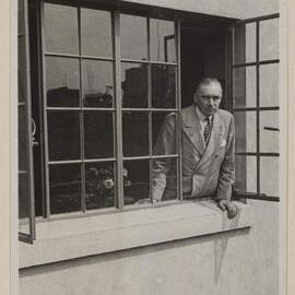 [Russell Grimwade at window] Flinders Lane [office, Melbourne]