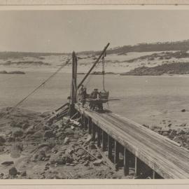 Granite blocks being loaded at Cape Everard, Victoria