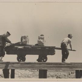 Granite blocks being loaded at Cape Everard, Victoria