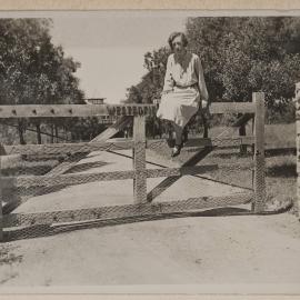 [Mab sitting on custom "Westerfield" timber entrance gate]