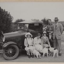 [Mab Grimwade and others with car and dogs]