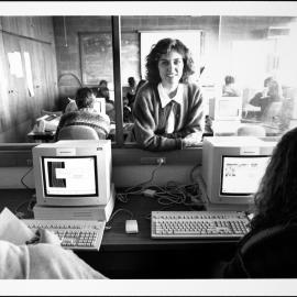 Biology. Roslyn Gleadow works with two students on one of the programs