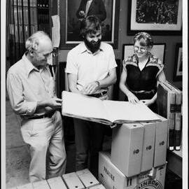 University Library Archives. Frank Strahan and others with CRA records